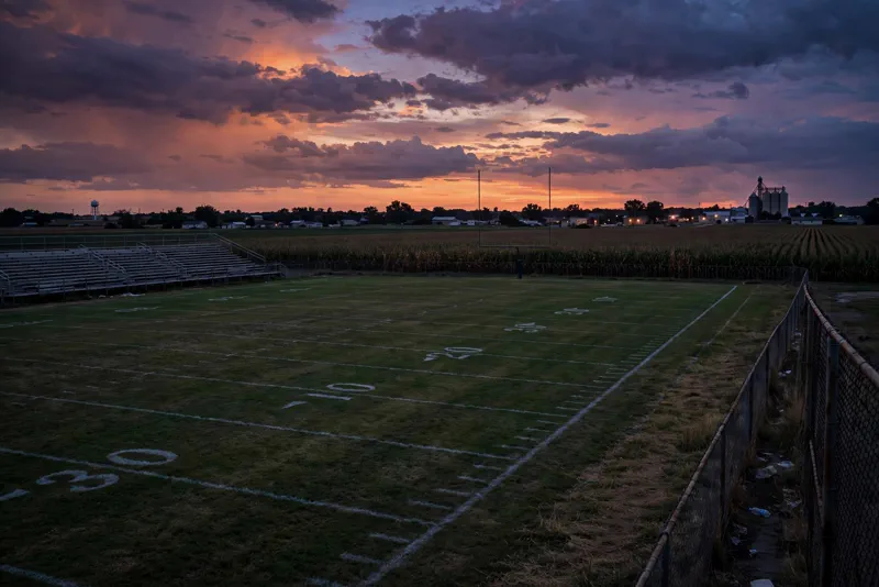 A high school football field in Nebraska at dusk