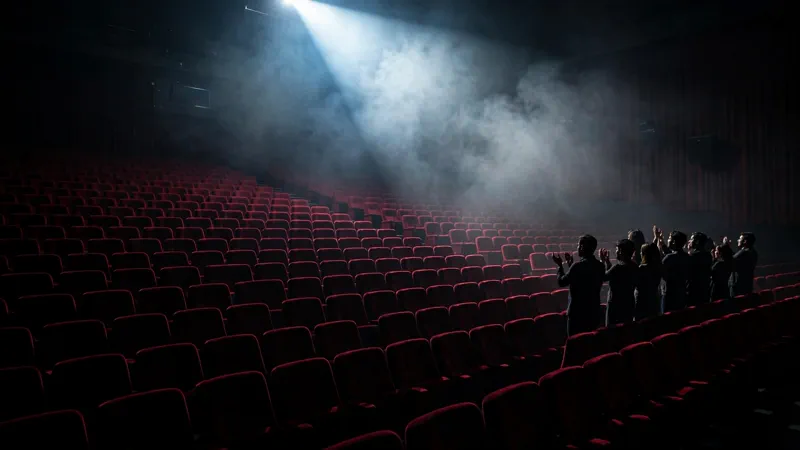 Half-empty cinema auditorium with a divided audience during Digger's theatrical run