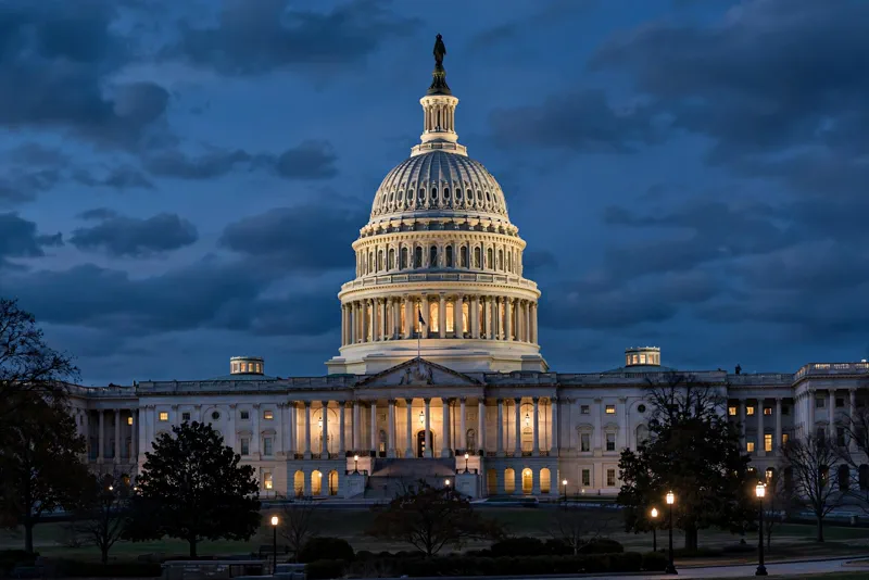 US Capitol dome illuminated at dusk