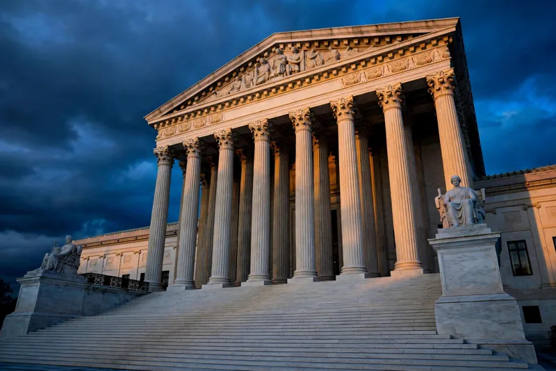 The U.S. Supreme Court building at dusk, where justices ruled that New Hampshire student IDs no longer count at the ballot box